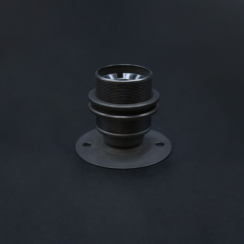 A dark bronze E27 period fixed ceiling light fixture made of solid brass, not wired, displayed on a dark background.